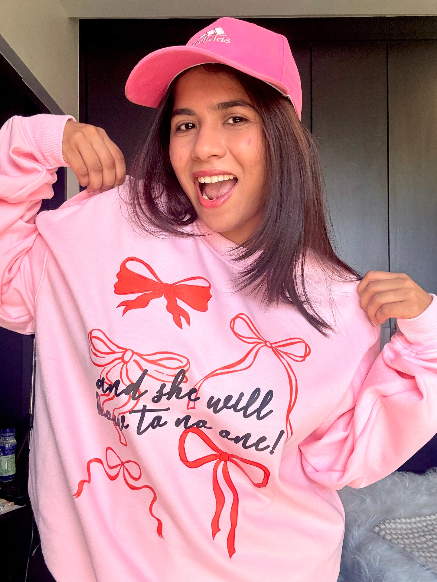 SHE WILL BOW TO NO ONE PINK OVERSIZED SWEATSHIRT